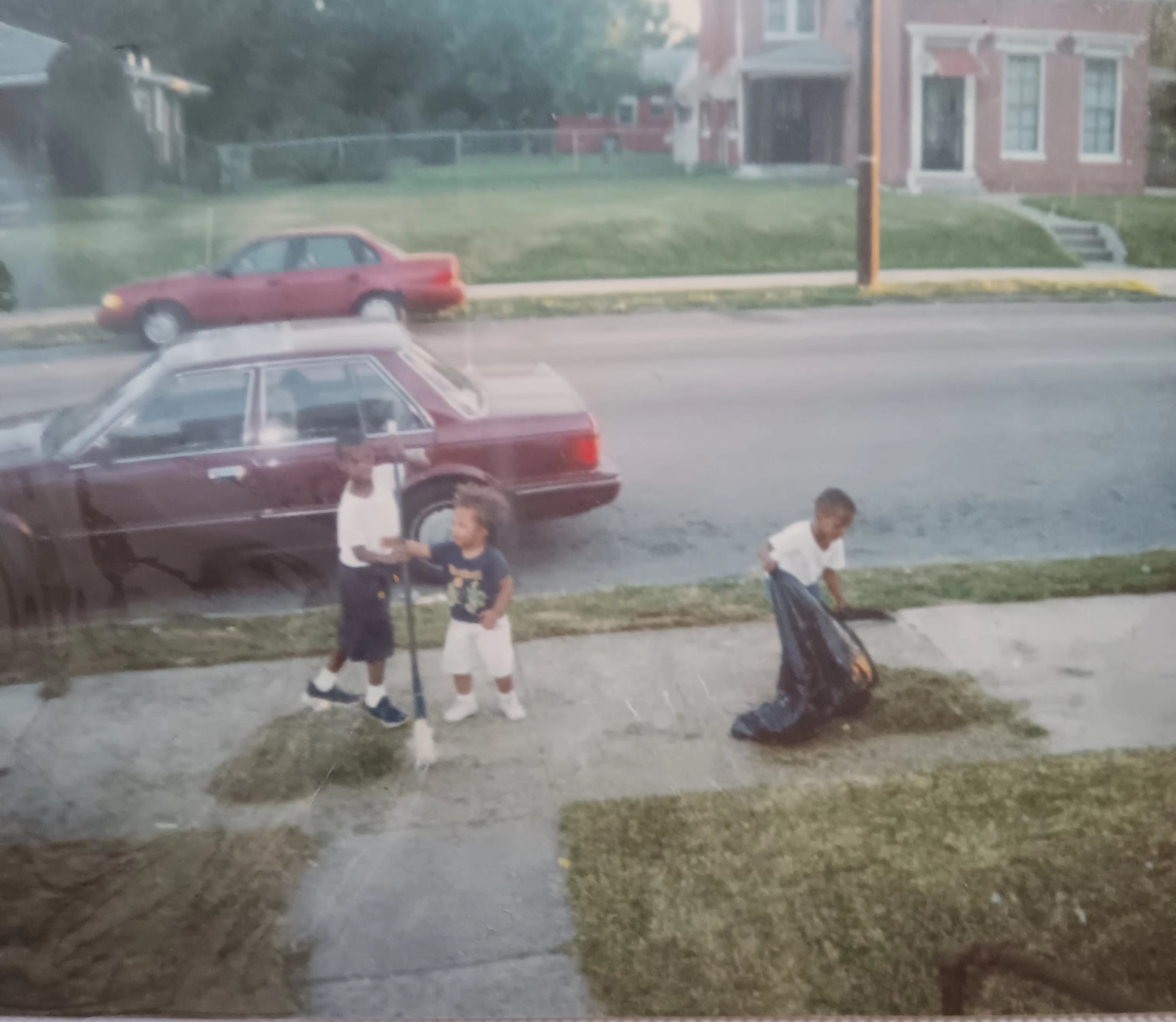 Boys doing chores outside
